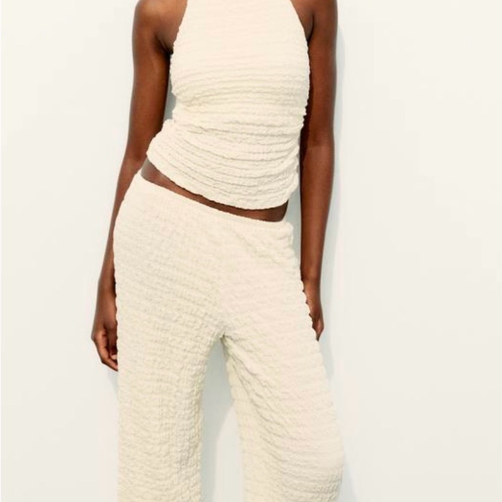 Cream Textured Jumpsuit with Wide-Leg Silhouette